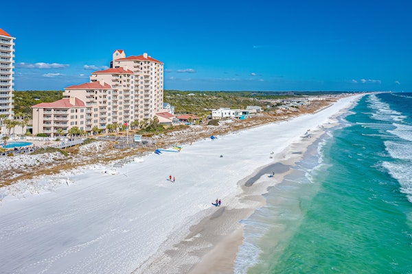 10th-Floor Gulf-Front Condo with Views and Pools