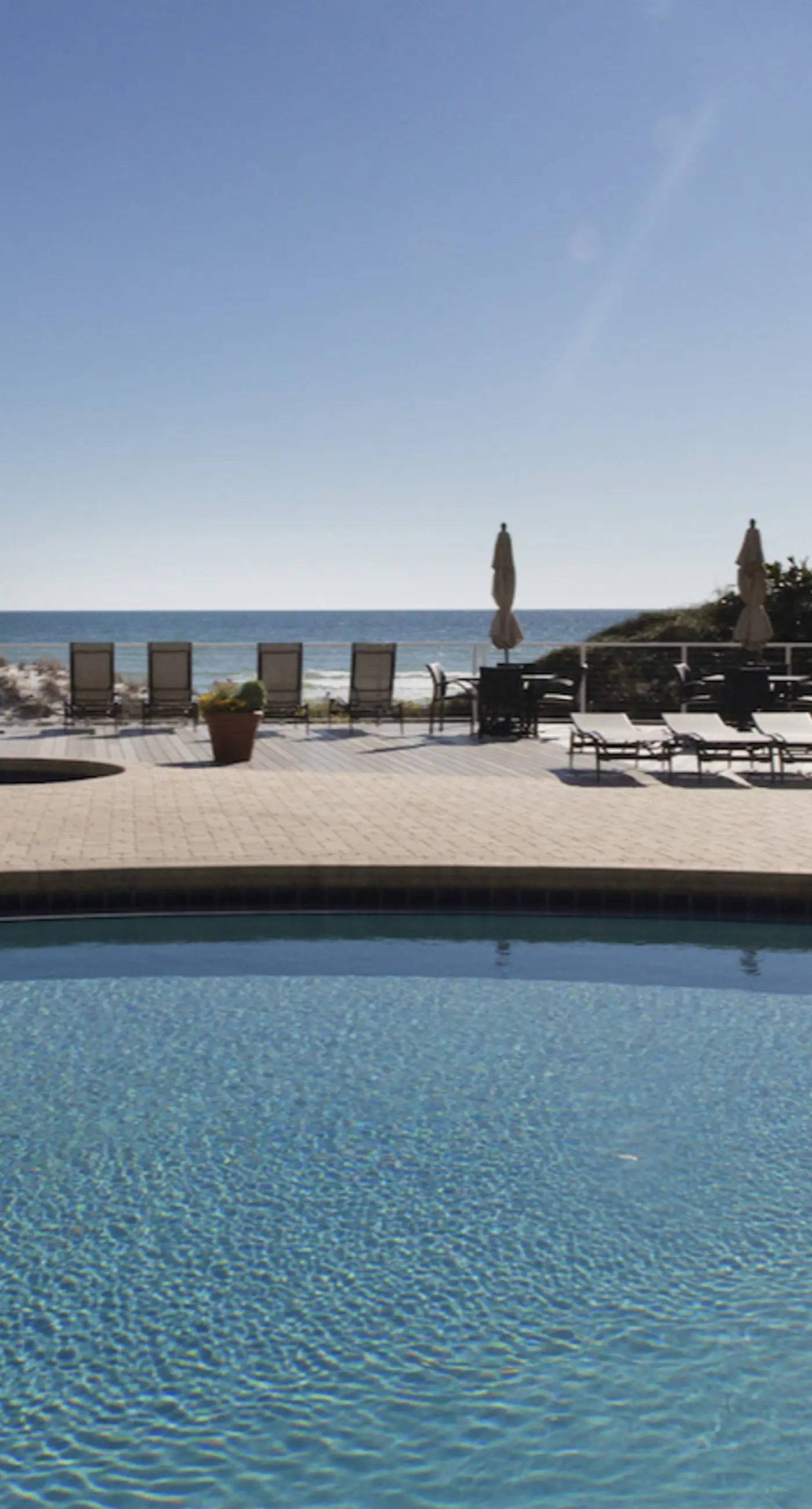 Exclusive beachfront condo w/ pool access
