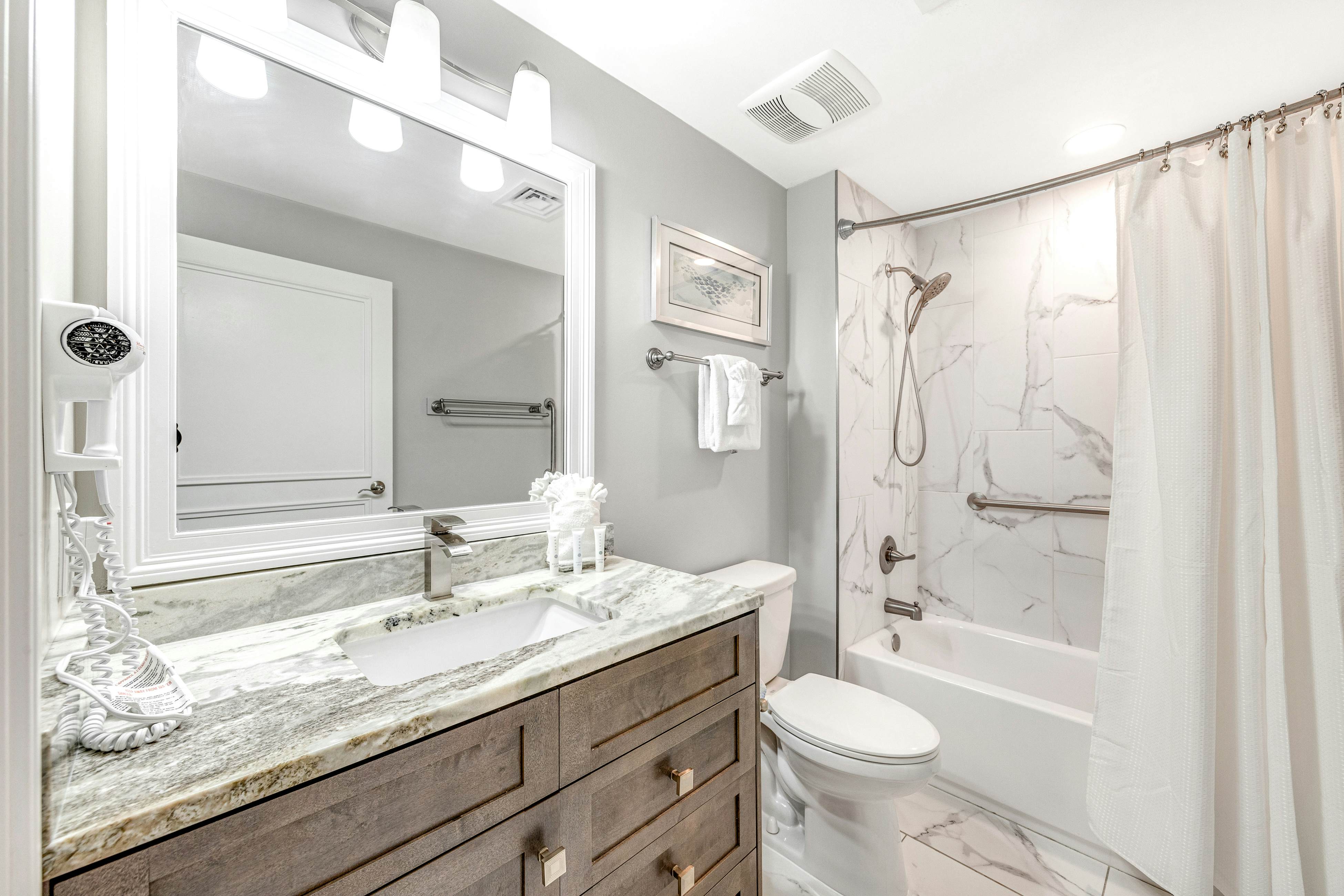 Condo with Shoreline Views and Resort Pools