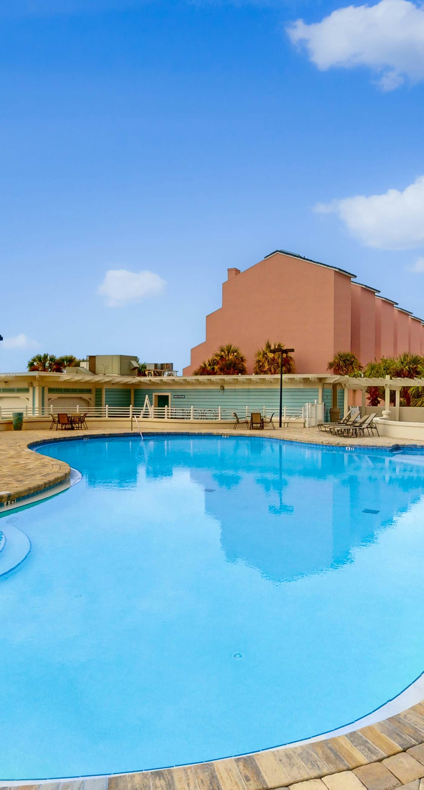 Elegant 9th-Floor Condo with Pools and Gym