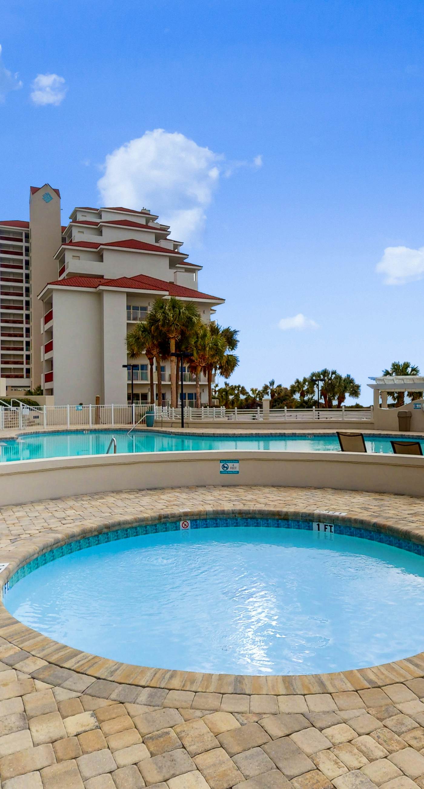 Elegant 9th-Floor Condo with Pools and Gym