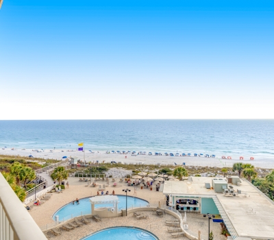 Bright Beachfront Condo with Pool and Balcony