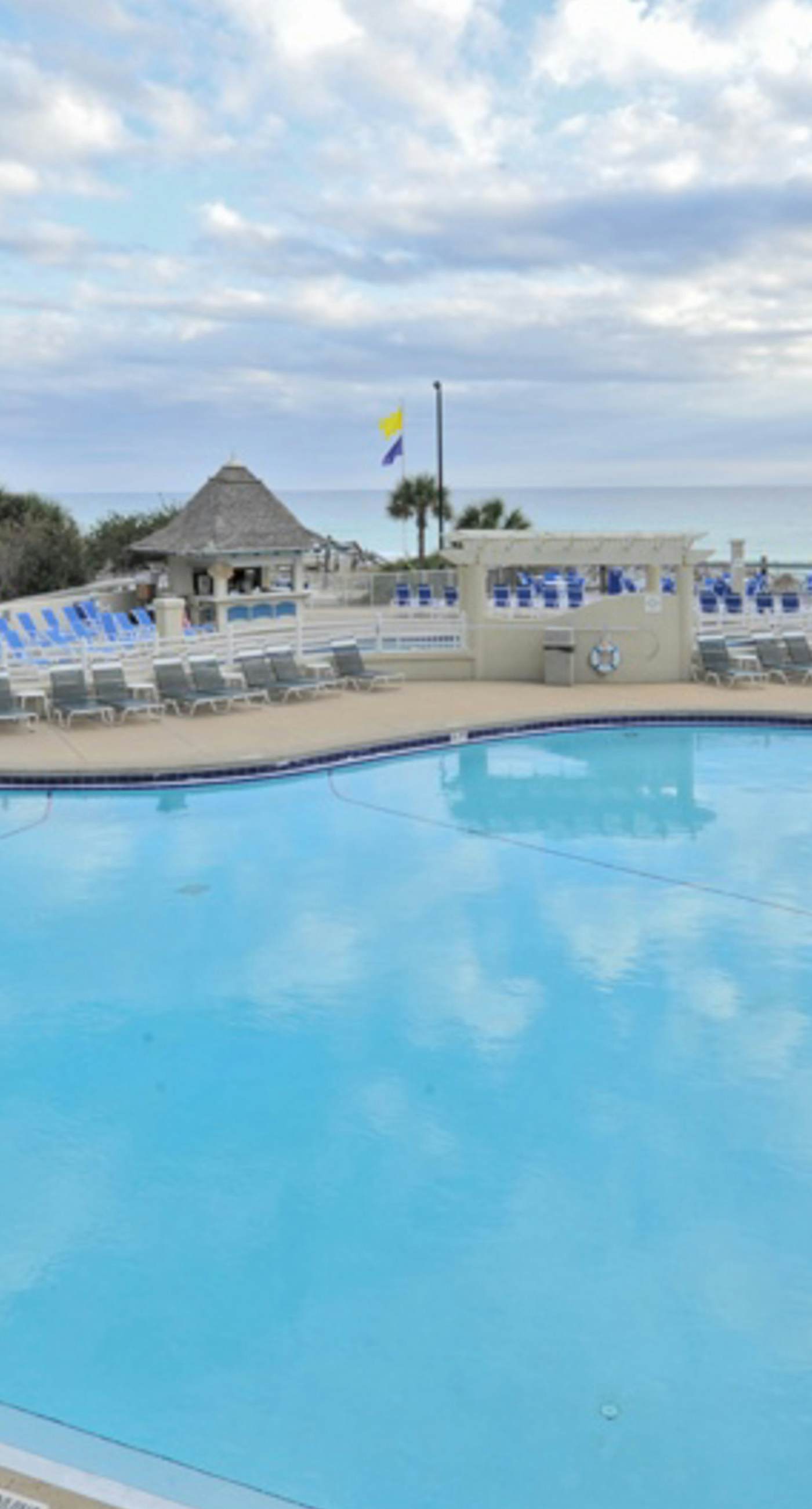 Bright Beachfront Condo with Pool and Balcony