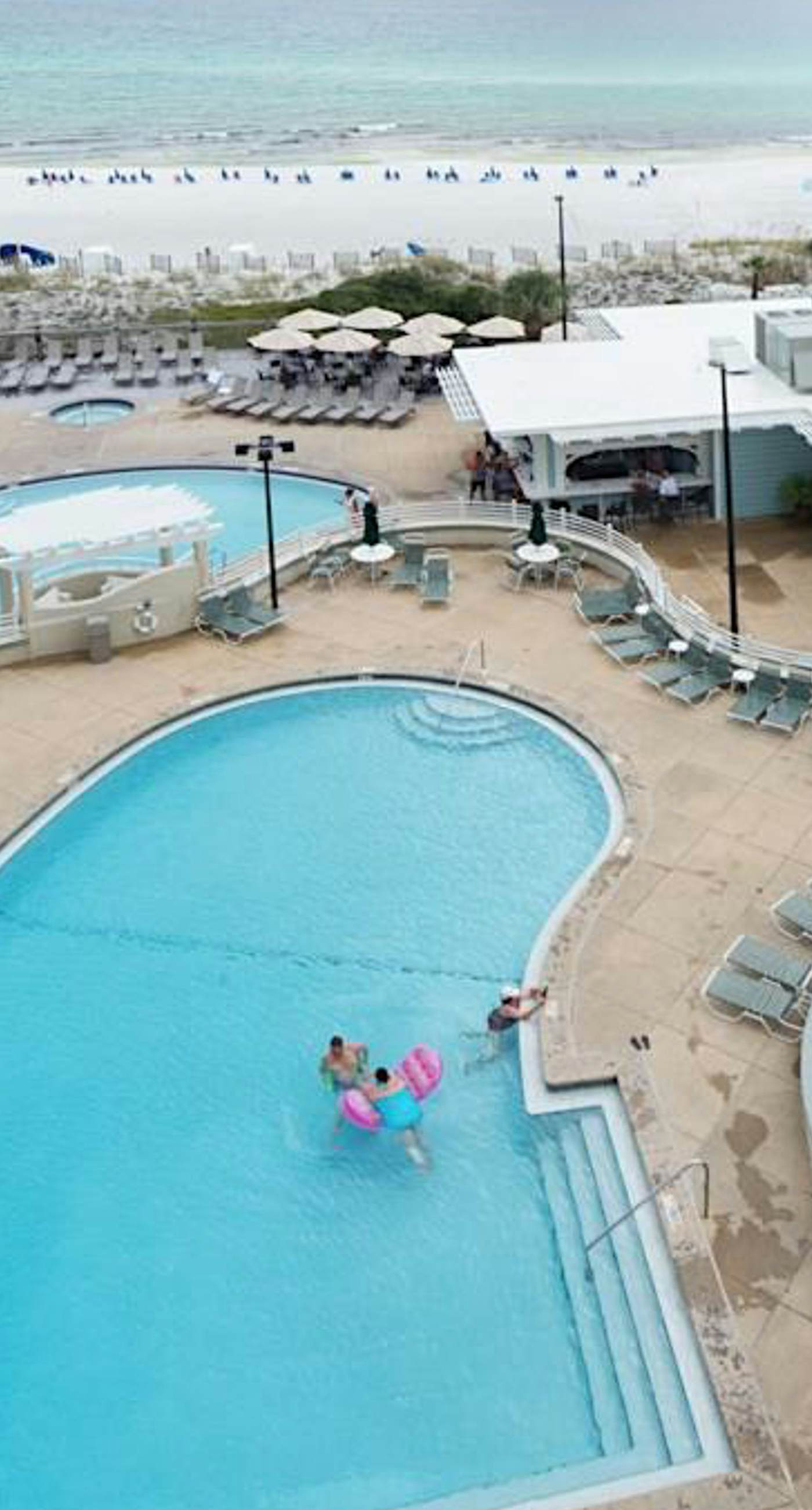 Bright Beachfront Condo with Pool and Balcony