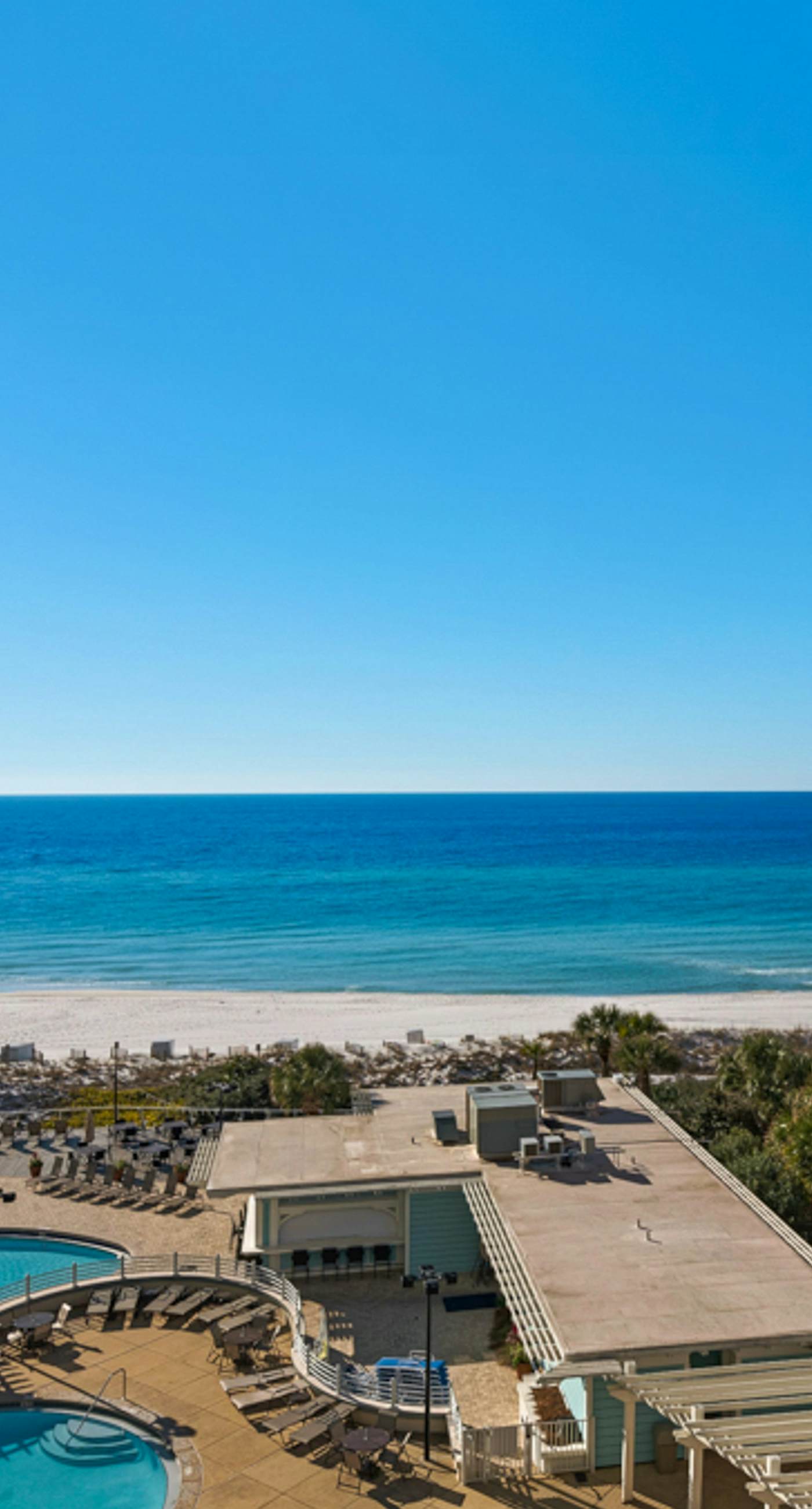 Bright Beachfront Condo with Pool and Balcony