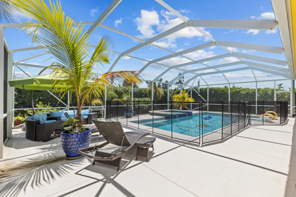 Luxurious 4-Bedroom Pool Home -Walk to Beach & Restaurants