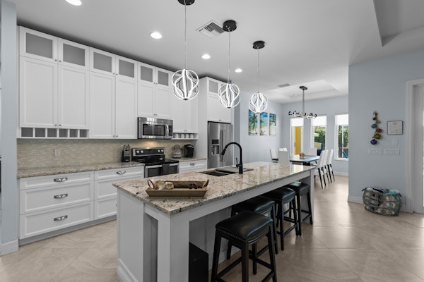 Luxurious 4-Bedroom Pool Home -Walk to Beach & Restaurants