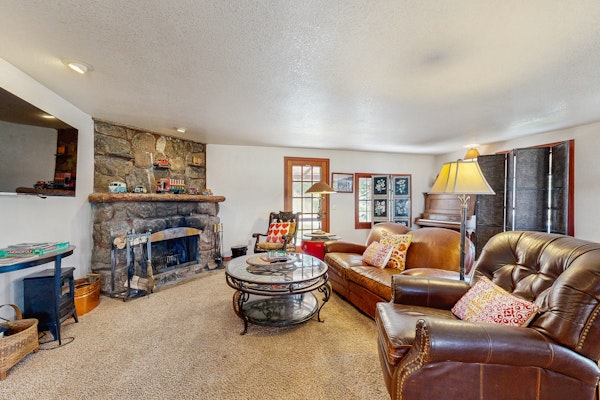 Historic mountain home w/ 180° views, fenced patio, & wraparound deck