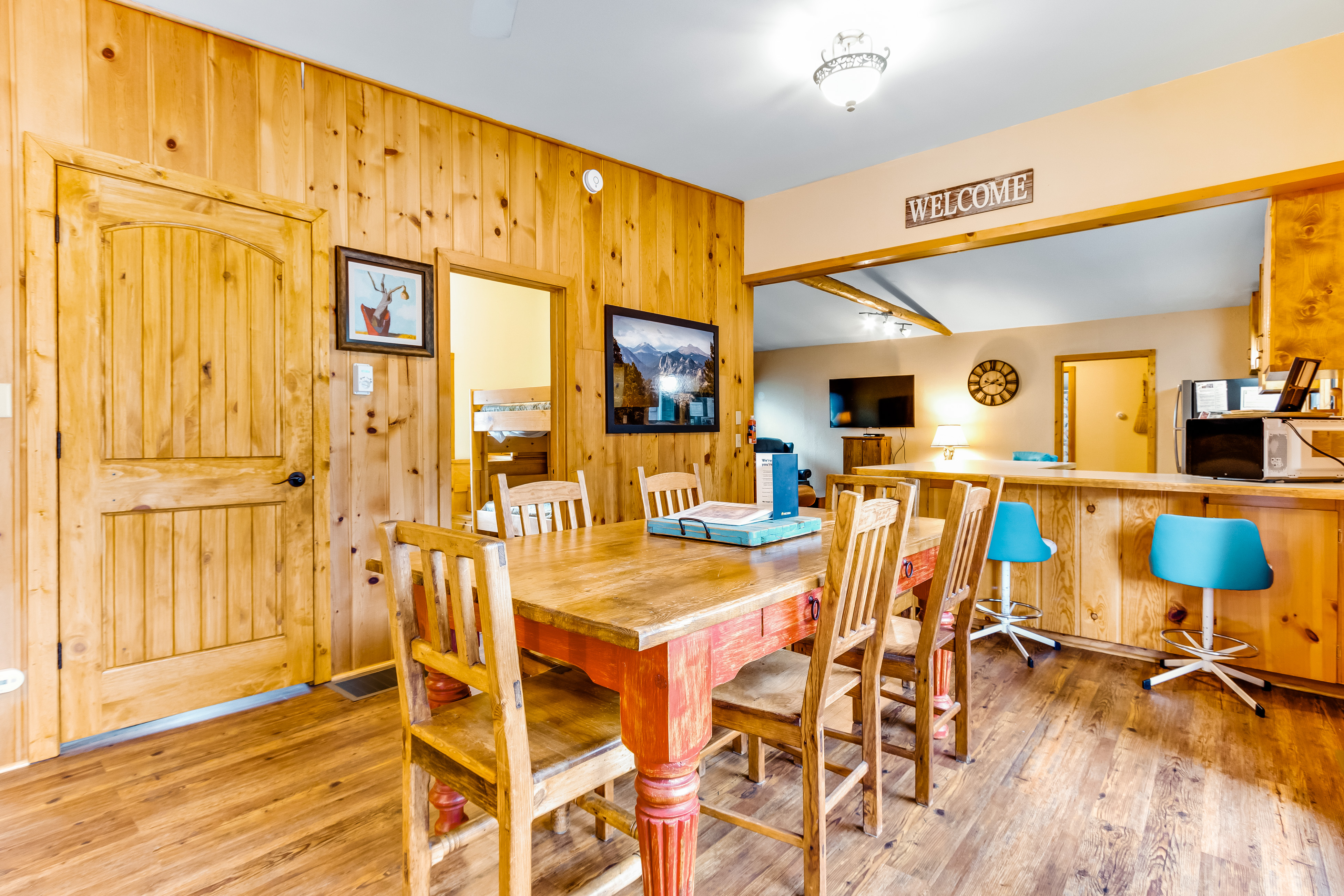 Cozy waterfront river cabin with mountain views, and a hot tub - dog friendly