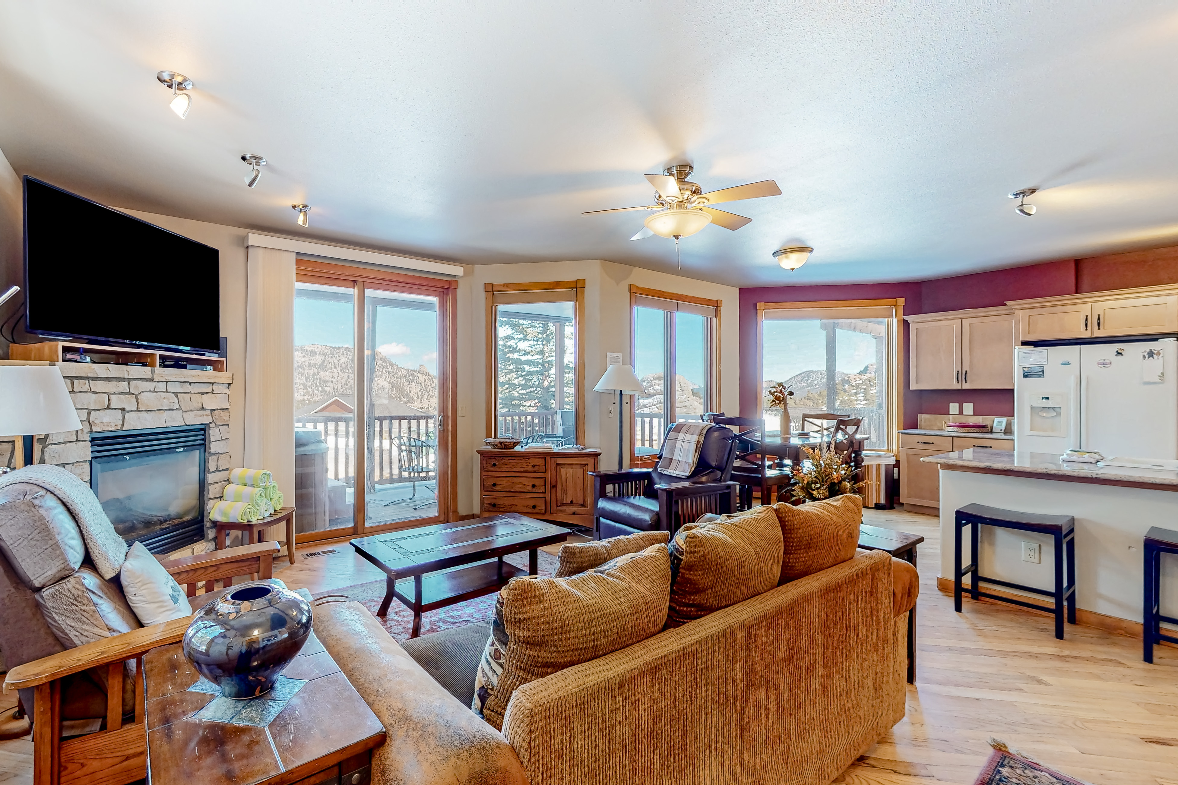 Mountain-view condo with deck, hot tub, gas fireplace, & W/D - quiet location