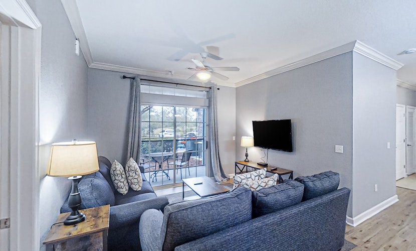 Enchanting condo with pool, hot tub, fitness area, balcony, & washer/dryer