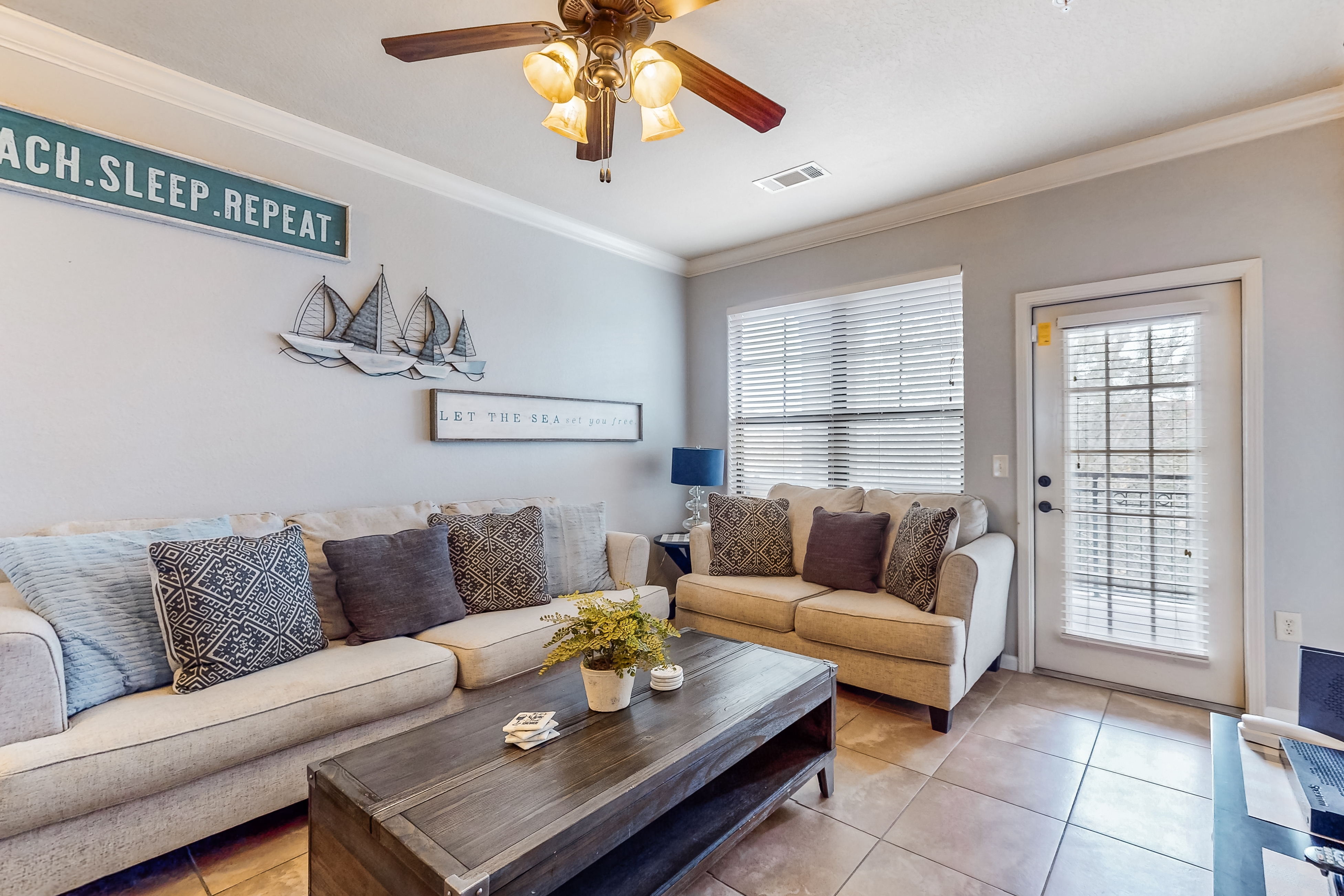 Serene condo with a balcony & a washer/dryer plus pools, gym, & game room