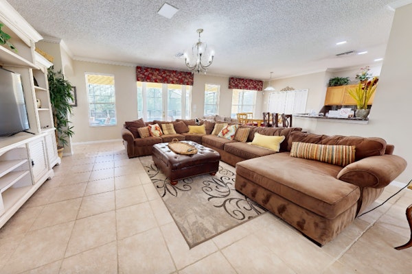 Sprawling home with pool, pool spa, & game room - athletic court and gym access