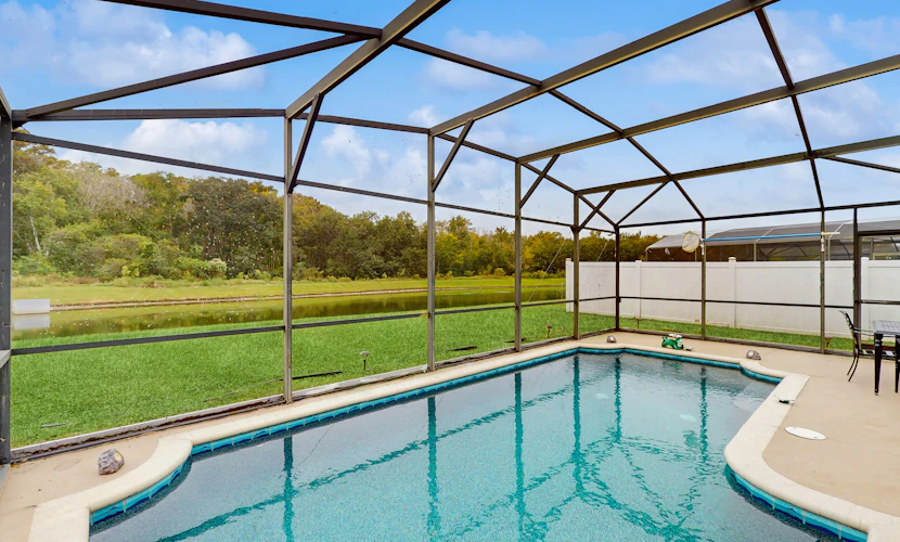 Inviting pool home with tranquil pond view near theme parks & attractions