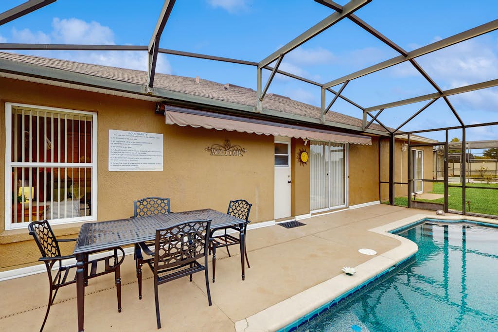 Inviting pool home with tranquil pond view near theme parks & attractions