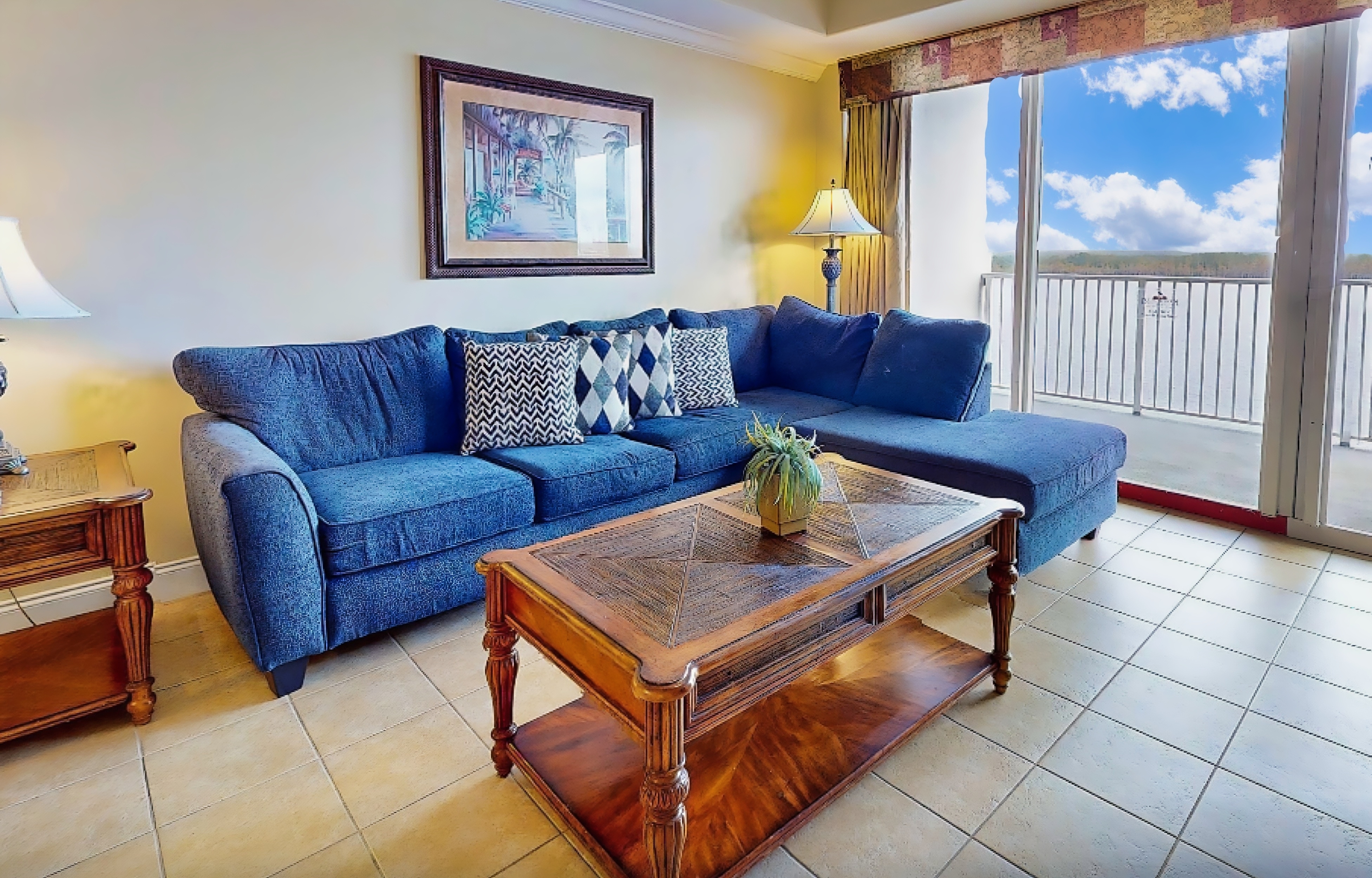 Lakefront condo with beautiful views, kitchen, AC, WiFi, gym, pool, & hot tub
