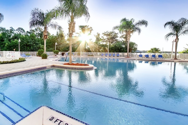 Lakefront condo with beautiful views, kitchen, AC, WiFi, gym, pool, & hot tub