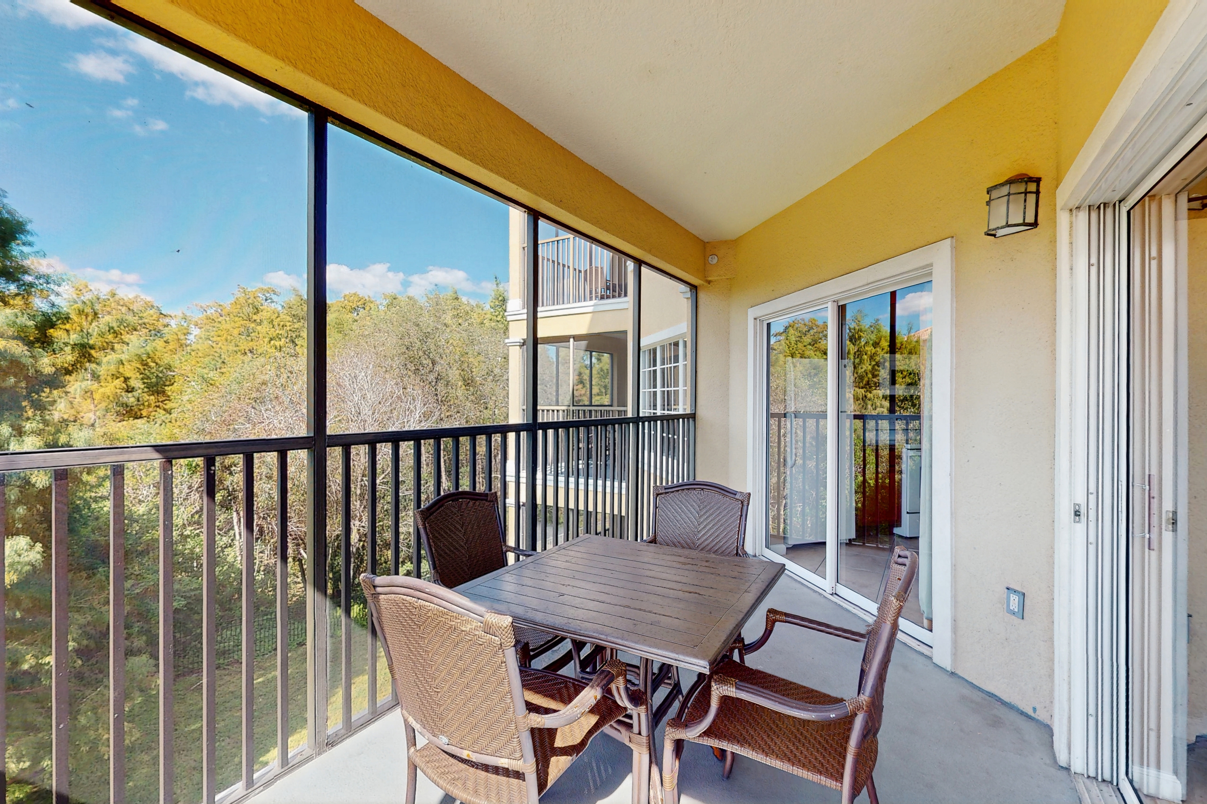 Modern Orlando condo with pool, balcony views, and Disney shuttle