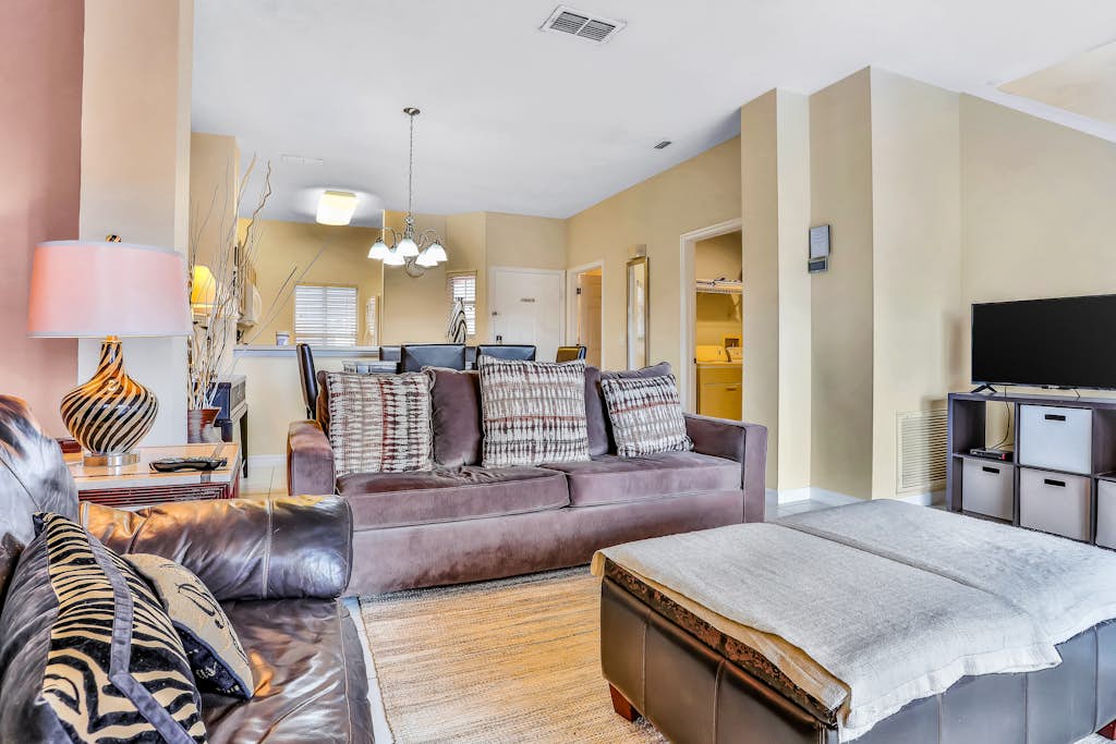 Two-story, dog-friendly gem near theme parks with pool, central AC & on-site gym
