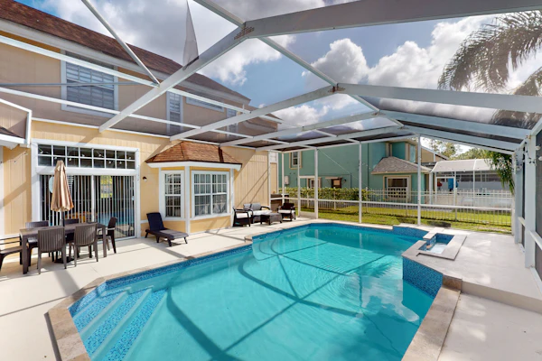 Easy-to-reach home with private screened pool, lanai, & AC - snowbird-friendly
