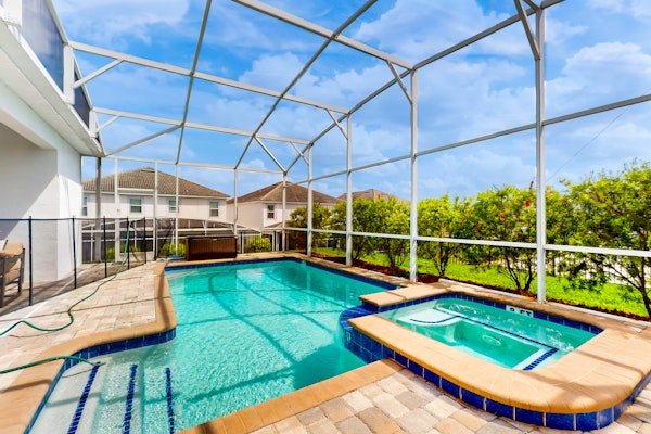 Two-story home with amazing pool, pool spa, game rooms, & washer/dryer