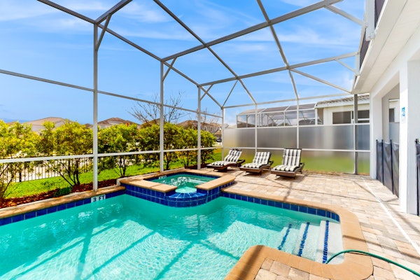 Two-story home with amazing pool, pool spa, game rooms, & washer/dryer