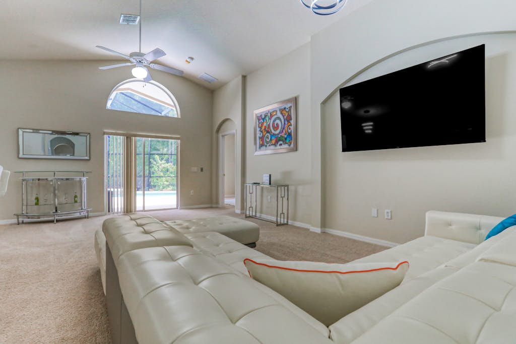 Stylish retreat with a private, heated pool, central AC, & garage game room