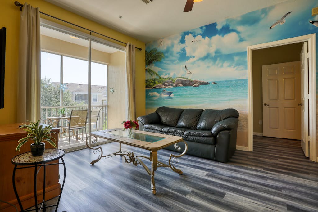 Resort condo with pools, hot tub, game room, tennis, gym, balcony, AC, & W/D