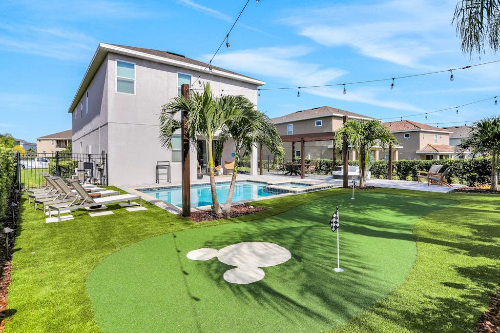 Dog-friendly getaway with private pool + spa, putting green, patio, & game room