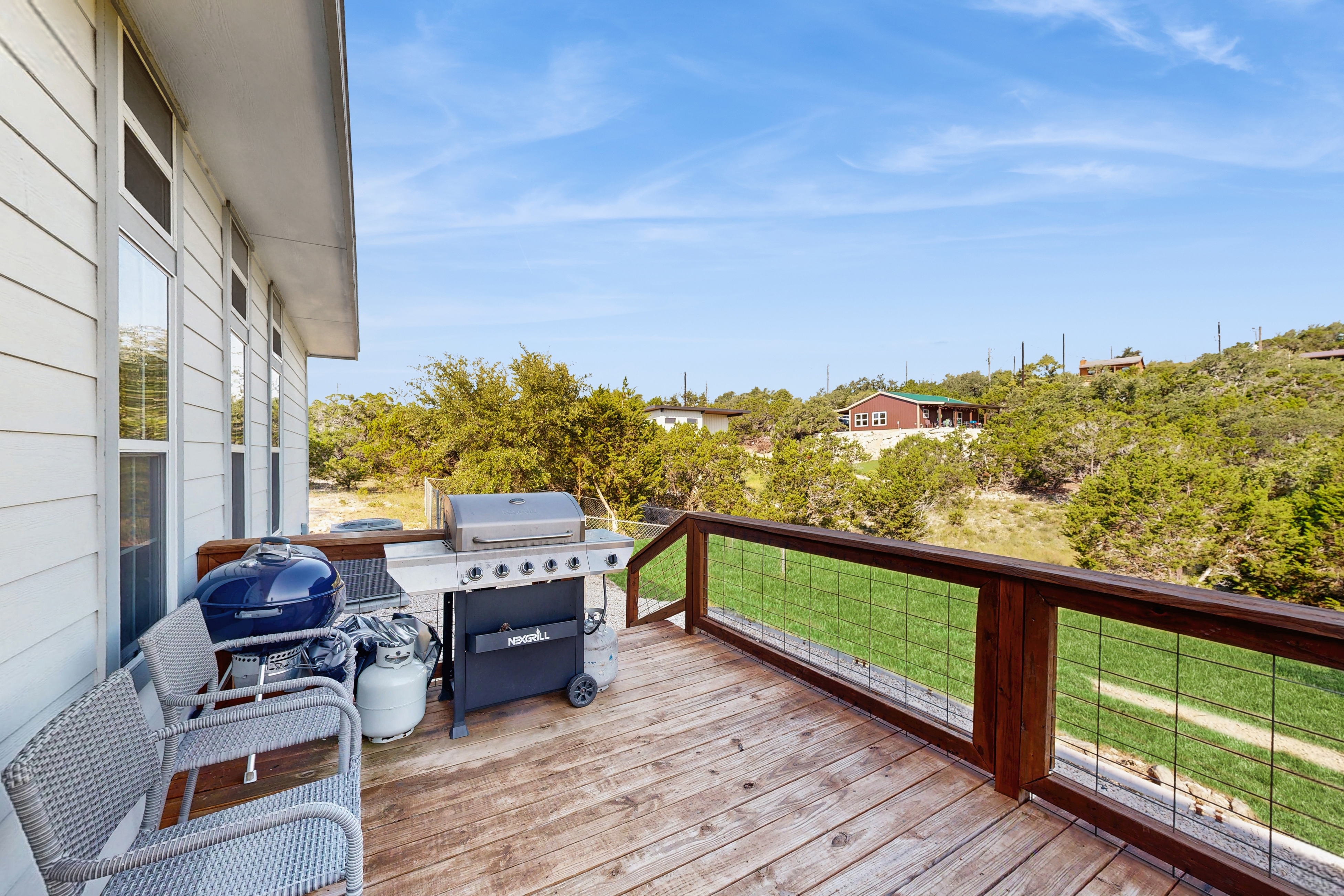 Modern home on half acre with amazing Hill Country location, scenic deck & AC