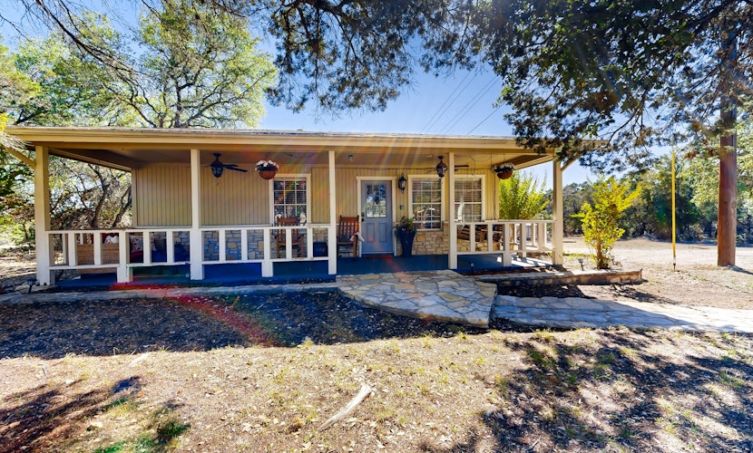 Dog-friendly country cottage with scenic hill views, wrap-around porch, and W/D