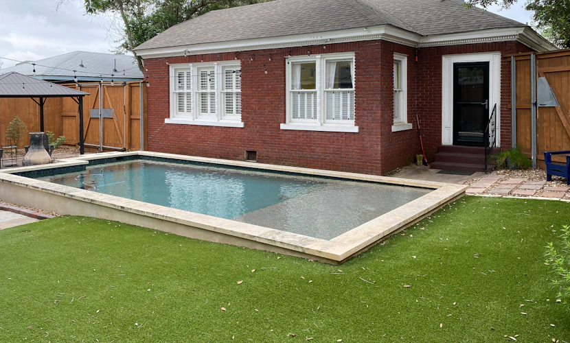 Charming home with pool, enclosed yard, patio & great Woodlawn Lake location