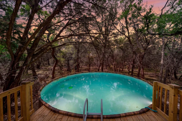 Modern Hill Country house & rustic cabin with a private pool and hot tub