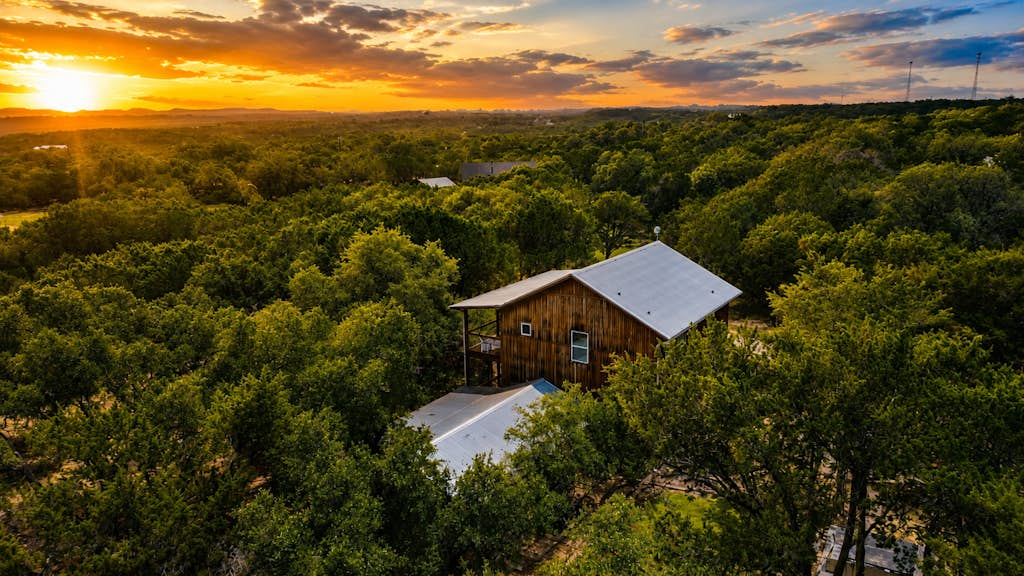 Modern Hill Country house & rustic cabin with a private pool and hot tub