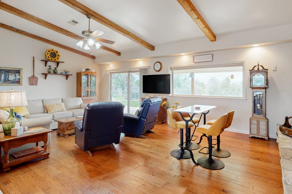 Sunny home with covered patio, grill, beautiful views, lawn, streaming, W/D, AC