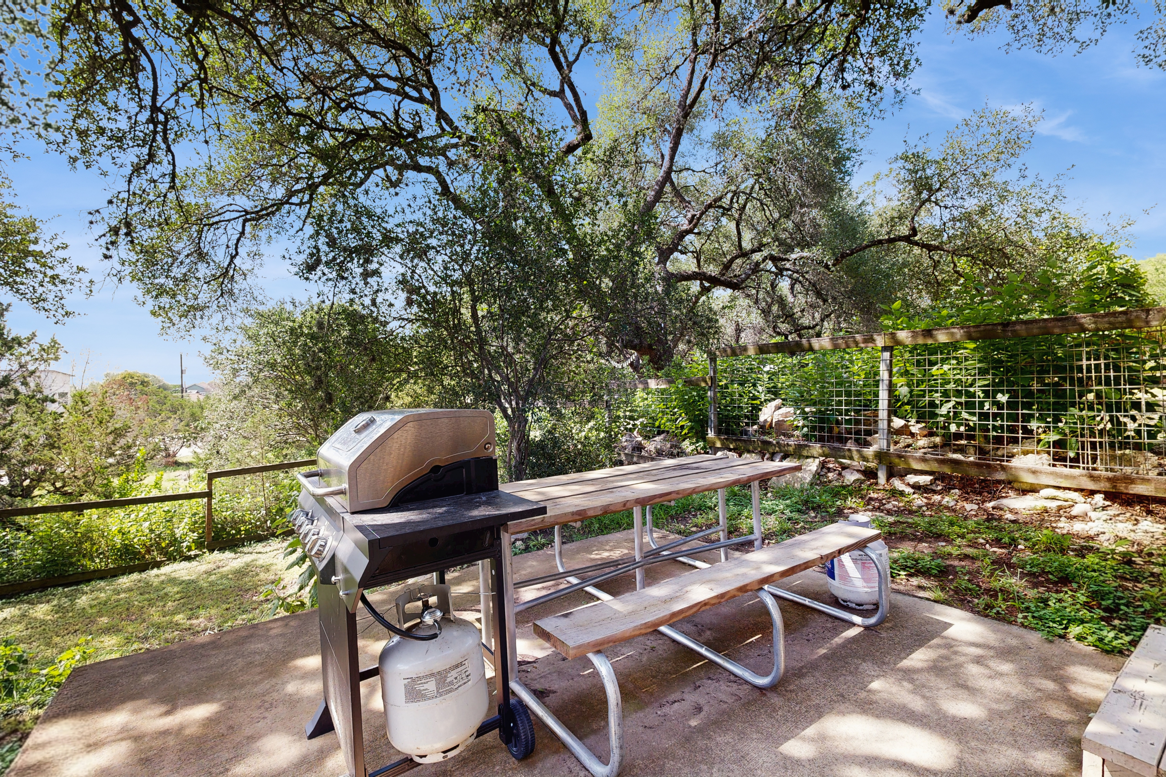 Quiet, private retreat with lake views, huge covered deck, W/D, & fenced yard