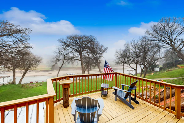 Idyllic waterfront getaway with private hot tub & deck views - near golf