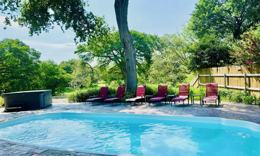 Idyllic waterfront getaway with private hot tub & deck views - near golf