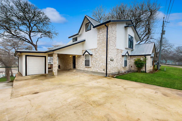 Idyllic waterfront getaway with private hot tub & deck views - near golf