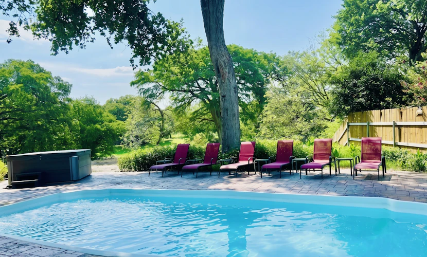 Idyllic waterfront getaway with private hot tub & deck views - near golf