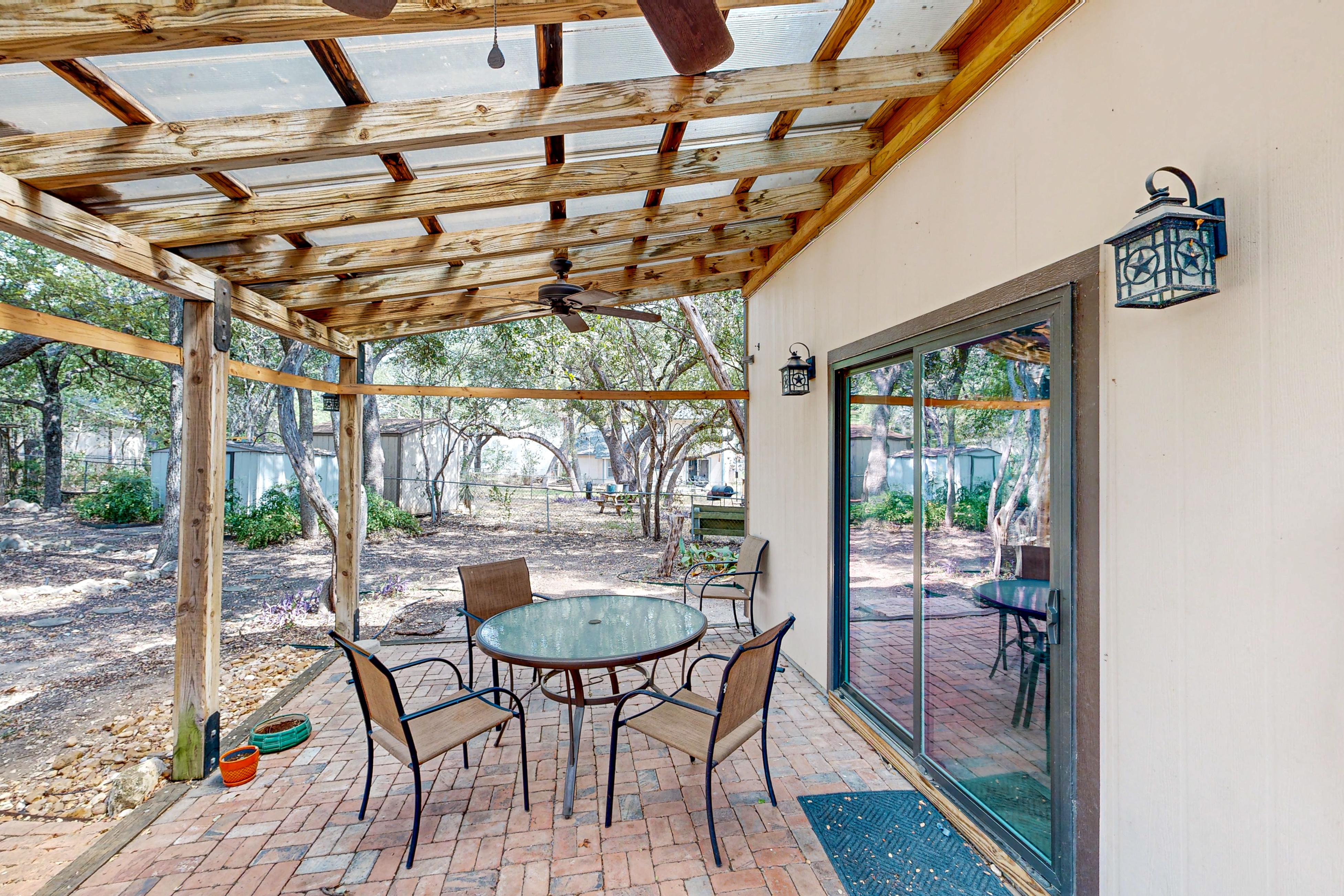 Dog-friendly home with huge yard, covered patio, & fireplace