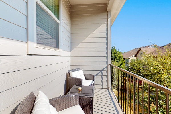 Modern townhome with enclosed yard, private balcony, & W/D - near local park