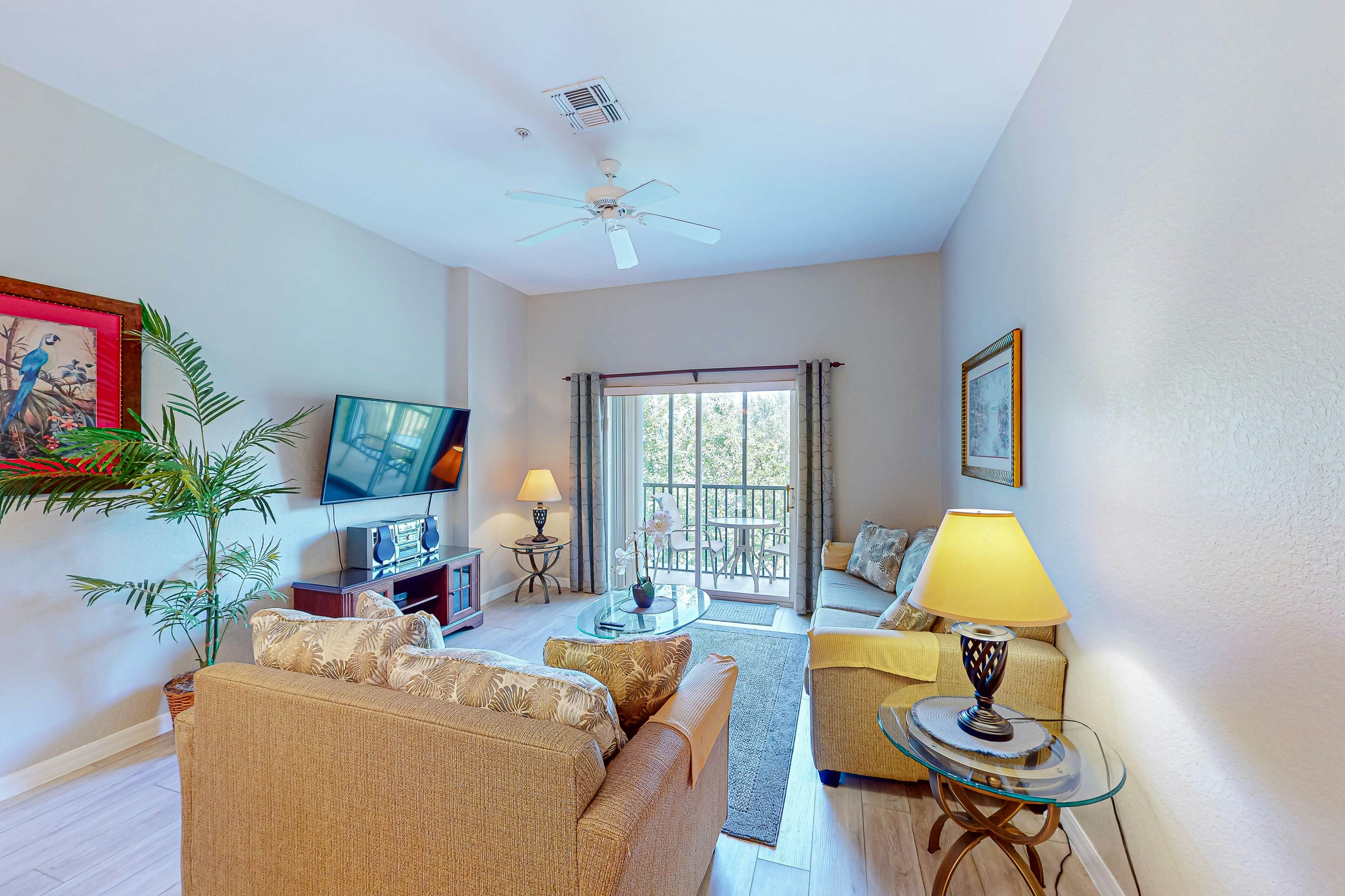 3rd-floor condo with sauna, balcony,  pools, tennis court, & gym