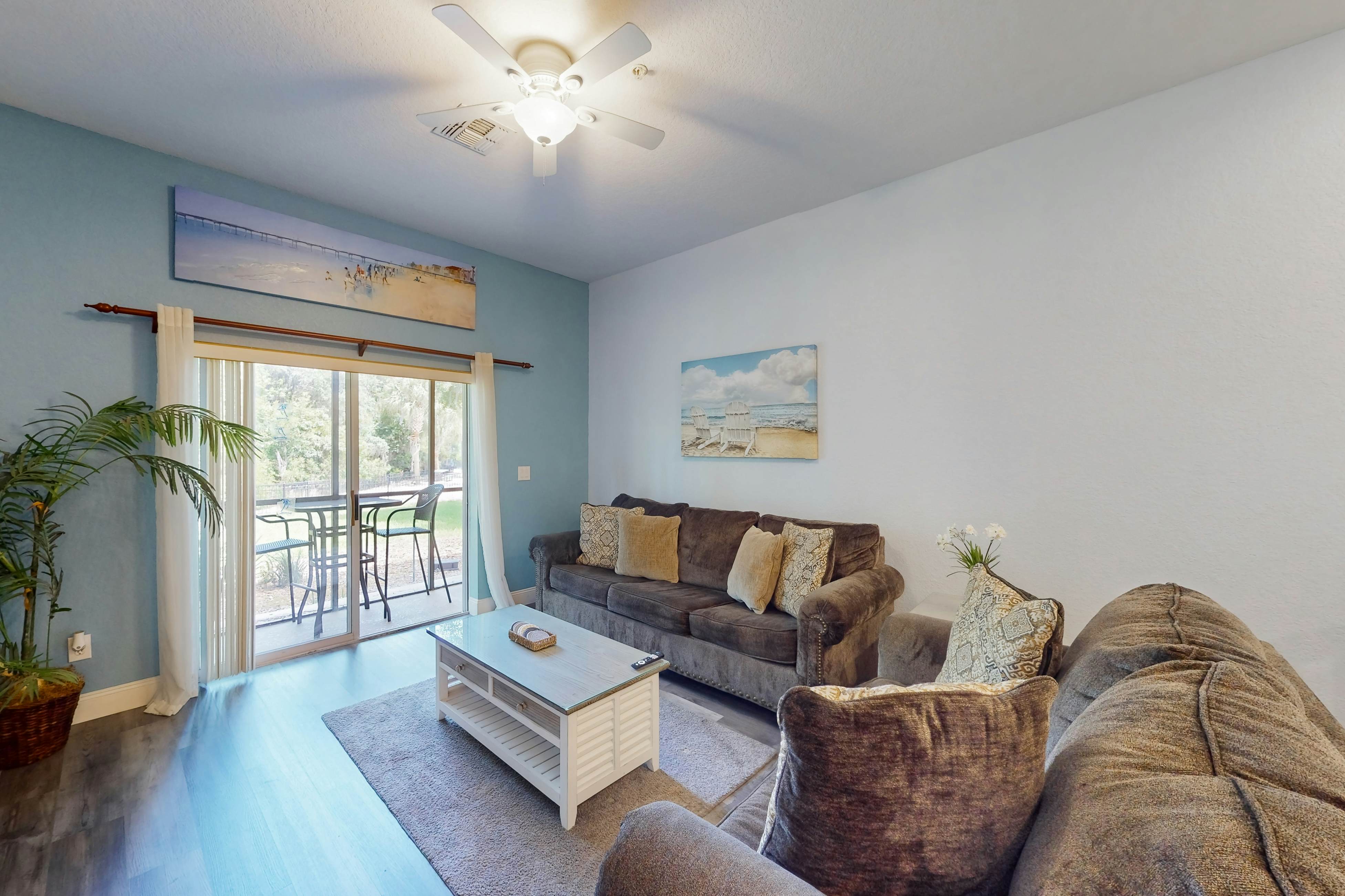 1st floor lake view condo with tennis, basketball court, pools, near theme parks