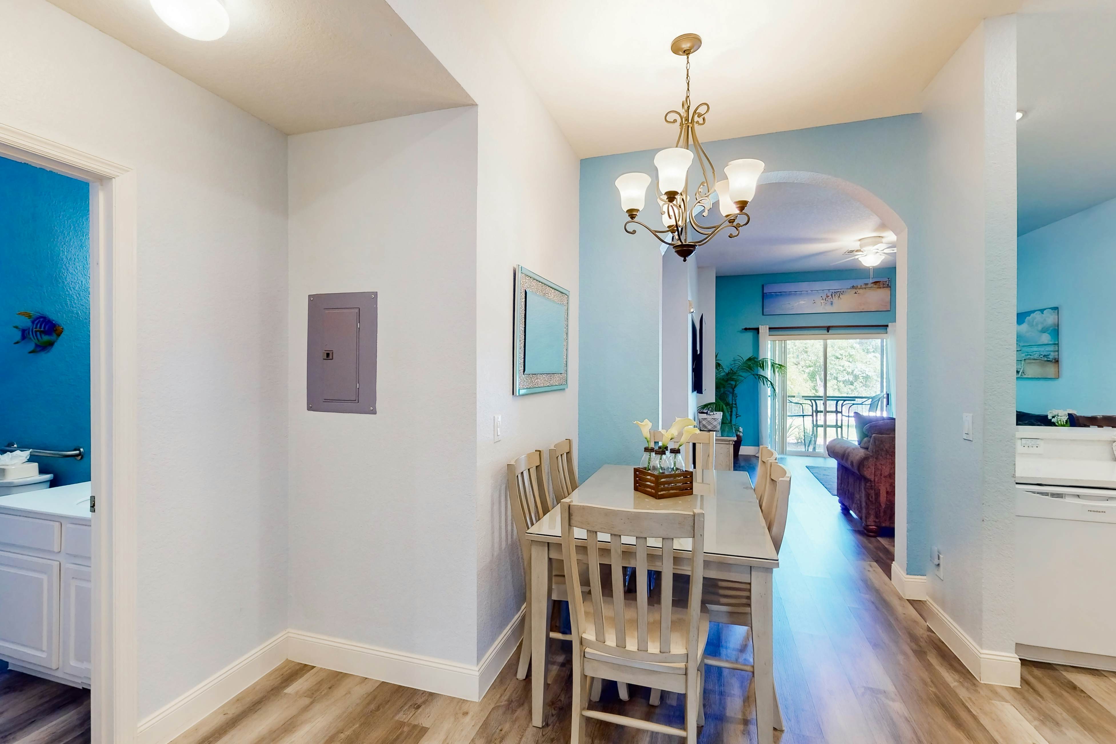 1st floor lake view condo with tennis, basketball court, pools, near theme parks