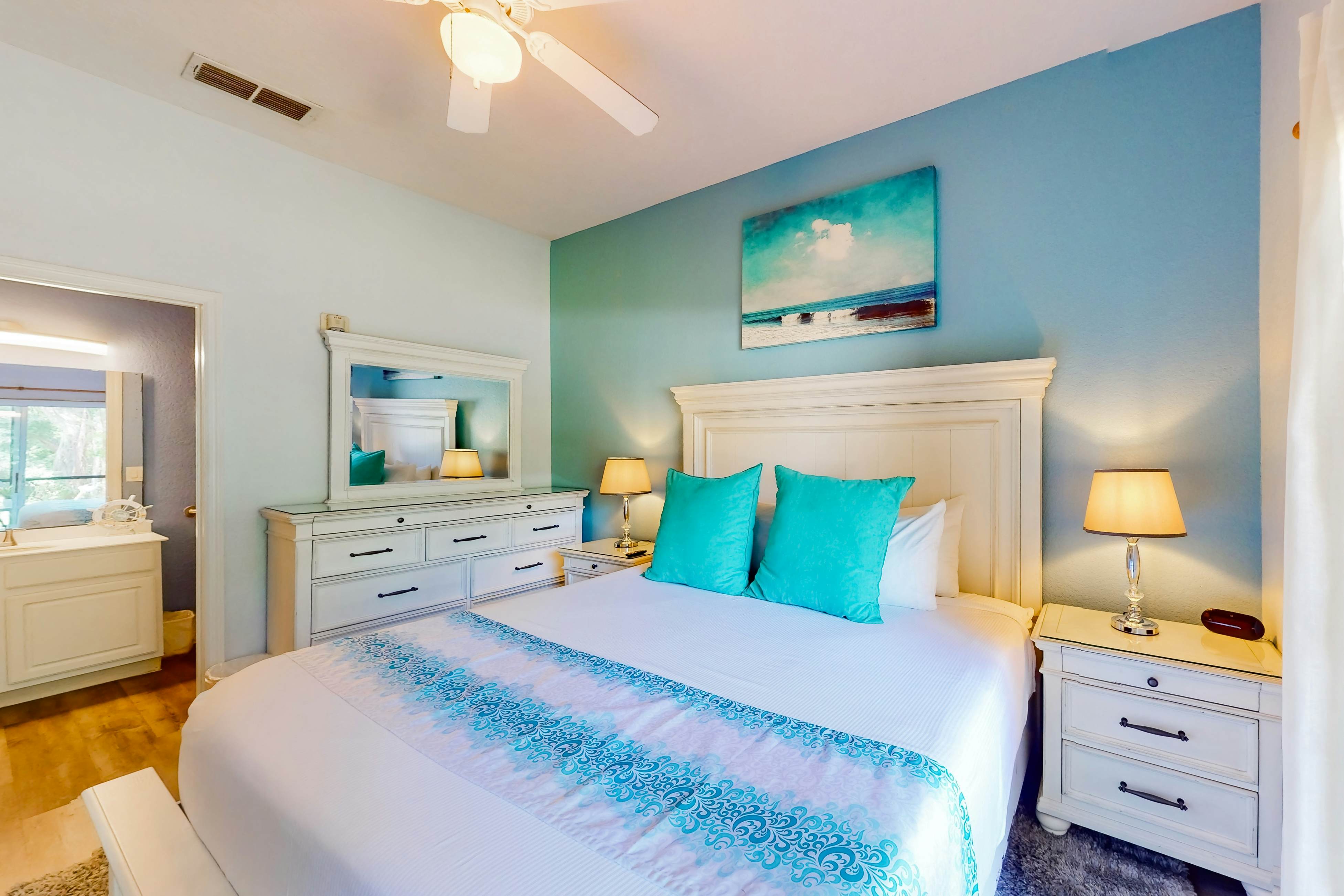 1st floor lake view condo with tennis, basketball court, pools, near theme parks