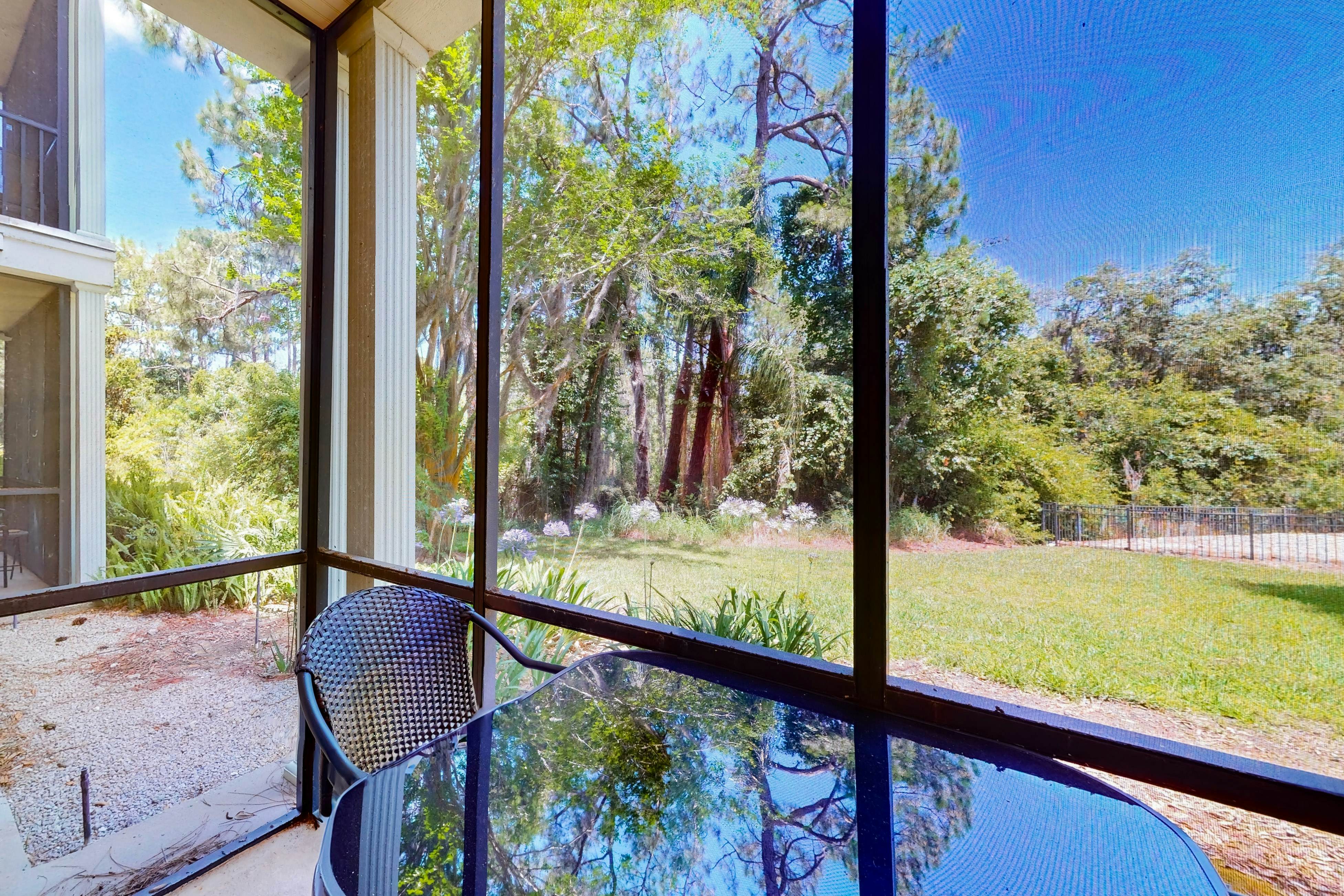 1st floor lake view condo with tennis, basketball court, pools, near theme parks