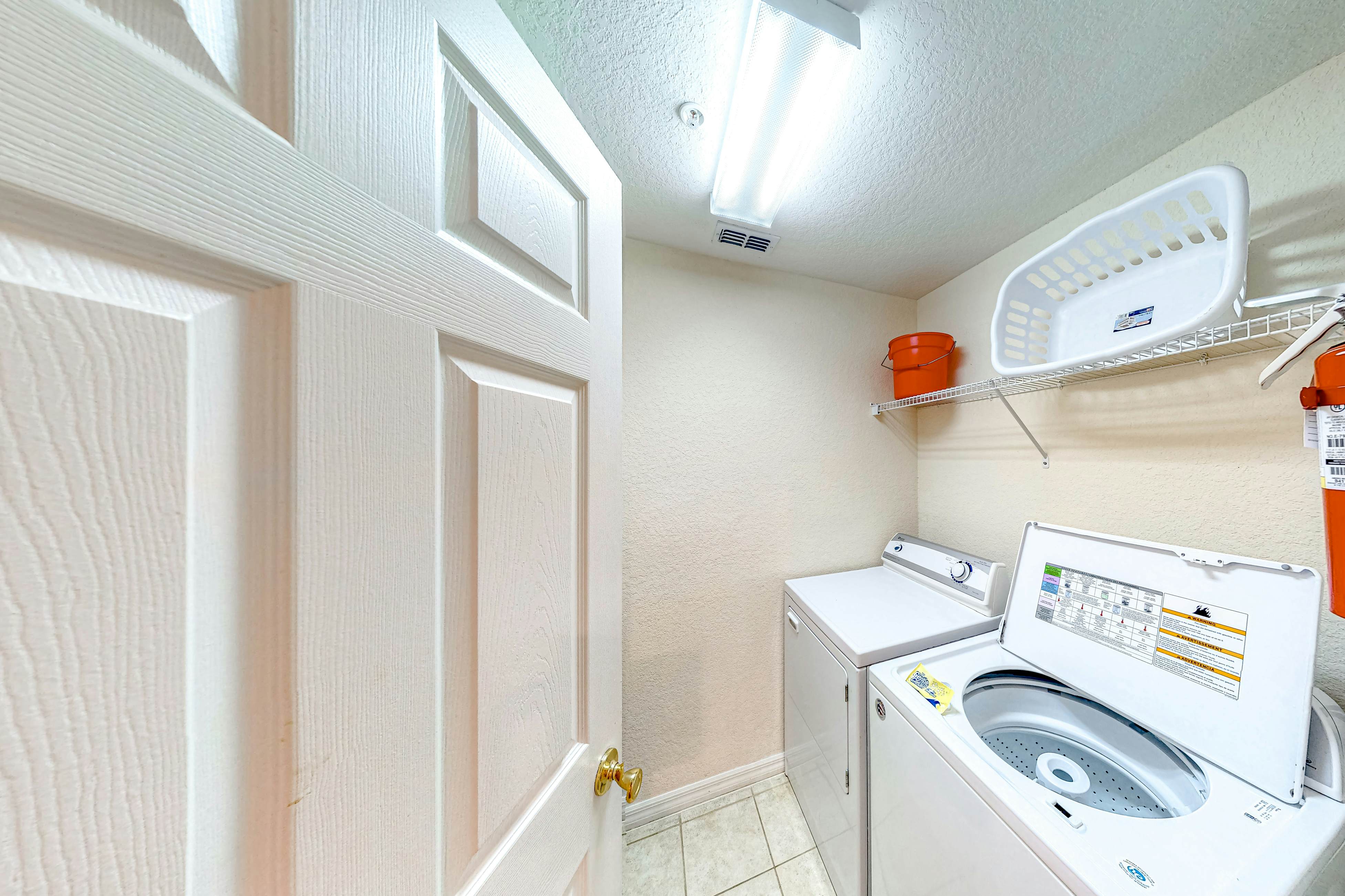 First-floor condo with restaurant, gym, basketball court, & sauna