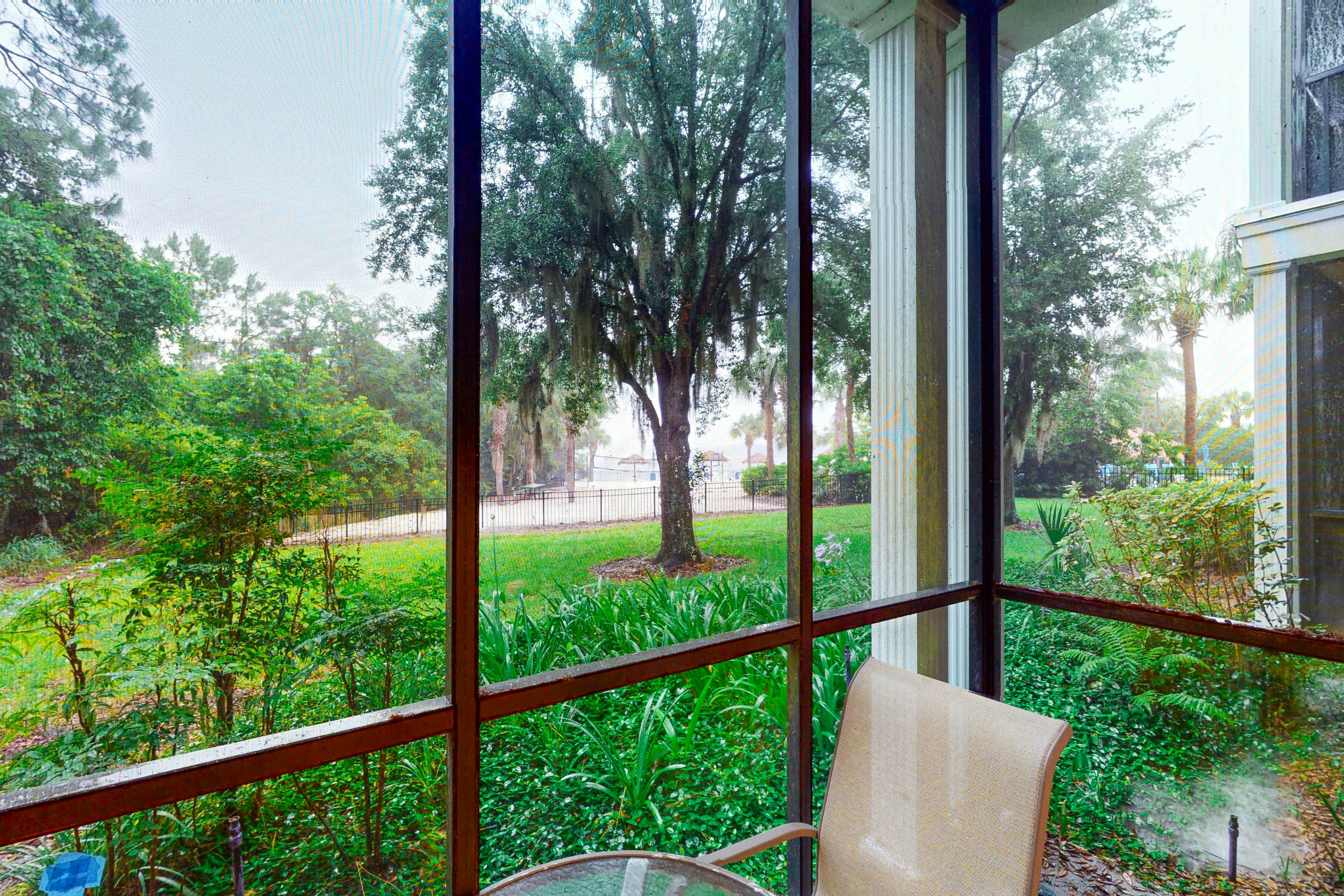 First floor lake view condo w/ pool & hot tub access, private W/D, & central AC