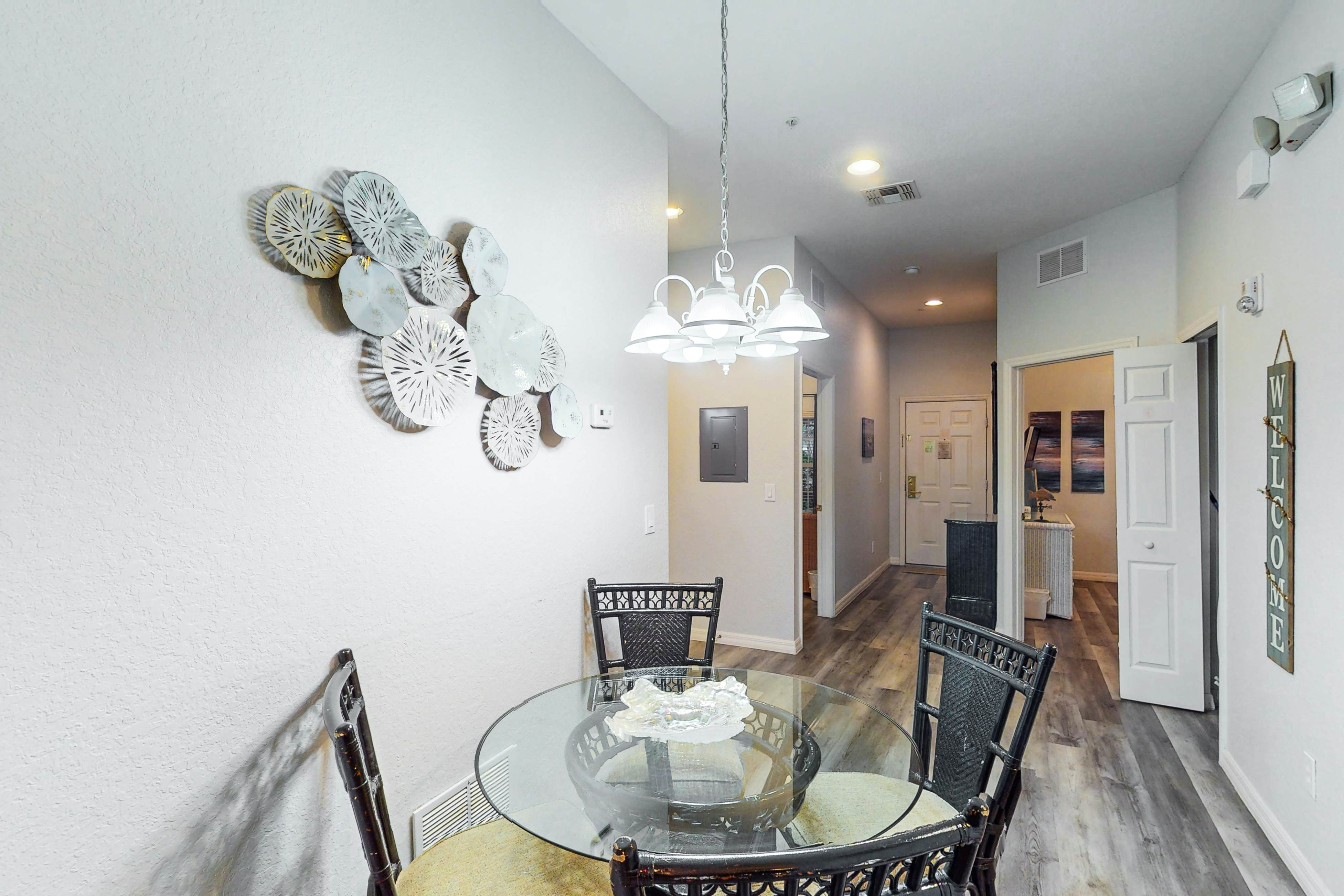 First floor lake view condo w/ pool & hot tub access, private W/D, & central AC